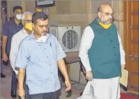  ?? PTI ?? Union home minister Amit Shah (R) and Delhi CM Arvind Kejriwal in New Delhi on Sunday.