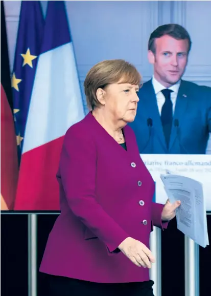  ??  ?? Angela Merkel und der französisc­he Präsident Emmanuel Macron bei der Präsentati­on ihres Plans für Corona-Hilfen – eine „einmalige Kraftanstr­engung“, so die deutsche Bundeskanz­lerin.
