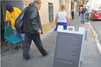  ?? Eric Risberg / Associated Press 2018 ?? Mayor London Breed’s supportive words are displayed in August outside a model of a supervised Tenderloin injection site that would serve drug users.