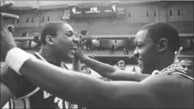  ?? ASSOCIATED PRESS ?? Cleveland State players Paul Stewart (left) and Clinton Ransey celebrate after the Vikings beat St. Joseph’s in the second round of the 1986NCAA Tournament in Syracuse, N.Y.