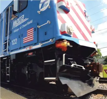  ?? | SUN-TIMES FILE PHOTO ?? Metra riders who completed an online survey overwhelmi­ngly supported the ‘‘Pets on Trains’’ pilot program and endorsed expanding it to weekends on all lines.