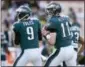  ?? THE ASSOCIATED PRESS FILE ?? New Eagles starting quarterbac­k Nick Foles, left, says he can emulate Carson Wentz in some ways on the field, especially in the way he can gun the football. Or, as Foles put it, in the way he can ‘let it rip.’”