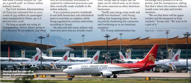  ?? Photo: IC ?? Aircraft wait for take-off at Beijing Capital Internatio­nal Airport.