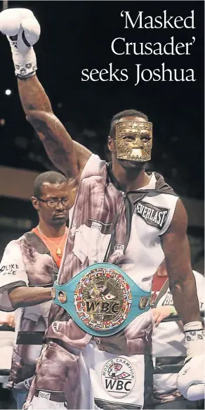  ?? Picture: GETTY IMAGES ?? MASKED CRUSADER: WBC world heavyweigh­t champion Deontay Wilder before his title defence against Chris Arreola at Legacy Arena in Birmingham last year, vows to finish off Bermane Stiverne tonight