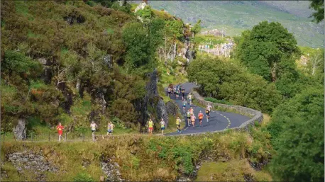  ?? Photos by Marek Hajdasz. ?? Half-marathon runners pictured on a scenic route in The Gleneagle Hotel ‘Run Killarney 2018’ last Saturday morning.