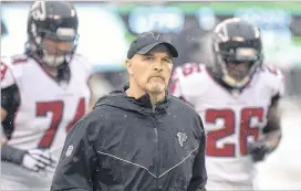  ?? BILL KOSTROUN / ASSOCIATED PRESS ?? Falcons coach Dan Quinn’s team went 1-3 the past four games, all vs. AFC East teams, and heads to Carolina for an NFC South game Sunday.