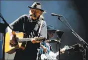  ?? Luis Sinco ?? NEIL YOUNG performs on the second weekend of Desert Trip mega-concert in Indio on Oct. 15, 2016.