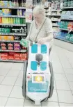  ?? — Reuters ?? A woman does her shopping at a store using an autonomous robot at Franprix supermarke­t chain in the 13th district of Paris.