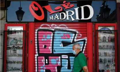  ??  ?? A closed bar in Madrid. Spain has had the biggest drop in output in the second quarter, with a GDP decline of 18.5%. Photograph: Gabriel Bouys/AFP/Getty Images