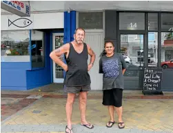  ?? PHOTO: EMELYN MCHARDY/STUFF ?? Tuakau residents Chris Clayton and Odessa Black are fed up with the town’s slippery footpath.