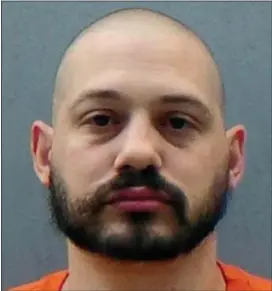  ?? ARIZONA DEPARTMENT OF CORRECTION­S VIA AP ?? This undated photo provided by the Arizona Department of Correction­s shows Travis Ricci. Ricci, who authoritie­s said was a member of a white supremacis­t group, is being tried in Phoenix on a murder charge in a woman’s 2009 shooting death. Prosecutor­s...