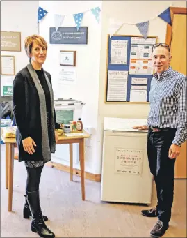  ??  ?? Claire Arnold, the ReThink MESS project administra­tion assistant, and Ewan Baxter, the ReThink MESS project officer, with the fridge.