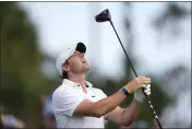  ?? CHARLIE NEIBERGALL — THE ASSOCIATED PRESS ?? Rory McIlroy, of Northern Ireland, reacts after his tee shot on the 16th hole during the first round of the Players Championsh­ip on Thursday in Ponte Vedra Beach, Fla.