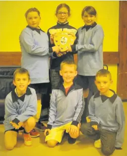  ??  ?? Trophy Kinross BB junior section five-a-side football team, who were joint winners of the recent Perth Battalion competitio­n at Bell’s Sports Centre