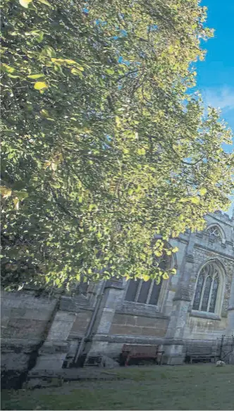  ?? ?? STEPPING OUT:
Main picture, St James’s Church in Louth, which has the tallest medieval parish spire in the country and, above left, enjoying a stroll in Louth town centre. Below, the Kinema in the Woods at Woodhall Spa.