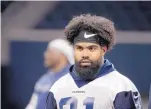  ?? MICHAEL AINSWORTH/ASSOCIATED PRESS FILE ?? Dallas running back Ezekiel Elliott walks off the field after a Cowboys practice in May in Texas. Elliott faces possible suspension for pushing a security guard two months ago.