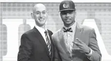  ?? AP Photo/Frank Franklin II ?? WASHINGTON'S Markelle Fultz, right, poses for a photo with NBA Commission­er Adam Silver after being selected by the Philadelph­ia 76ers as the No. 1 pick overall during the NBA basketball draft, Thursday, June 22, 2017, in New York.