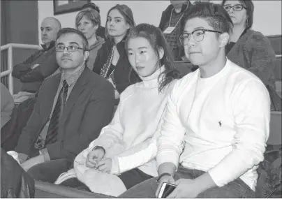  ?? SHARON MONTGOMERY-DUPE/CAPE BRETON POST ?? Mike Kelloway, left, president of bayitfowar­d, sits with Billy He, a fourth-year business student at Cape Breton University, and He’s girlfriend Jean Kong, during Local Wise, a Glace Bay Business Day, at the Cape Breton Miners’ Museum on Tuesday. About...