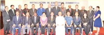  ??  ?? Yee (seated fifth left) with Bro. Justin (seated sixth left) and the new committee members. Kapitan Li is at back row, fourth right.