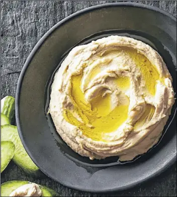  ?? MIKE GARTEN ?? Our classic hummus recipe is extremely versatile - and delicious.