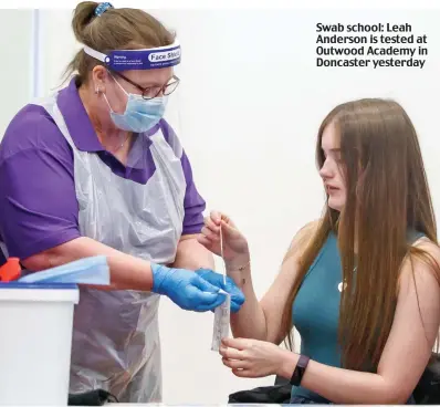  ?? ?? Swab school: Leah Anderson is tested at Outwood Academy in Doncaster yesterday