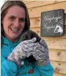  ??  ?? ● Virginia Crosbie MP with Bonnie the hedgehog at Hedgehuggl­es Rescue, Valley.