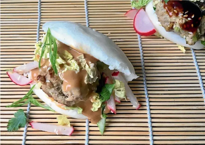  ?? LUCY CORRY ?? Who doesn’t love burgers? For something a bit different try these pork and ginger baby bao burgers.