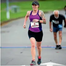  ?? PHOTOS: DAVID UNWIN/FAIRFAX NZ ?? Brendon Worthingto­n won the Manawatu Marathon by 11 minutes from his nearest rival while Picton’s Natalie Sutton was the first woman to finish.