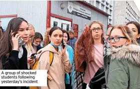  ??  ?? A group of shocked students following yesterday’s incident