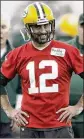  ?? ADAM WESLEY / AP ?? Green Bay quarterbac­k Aaron Rodgers began a normal practice regimen for Sunday’s key NFC game at Carolina.