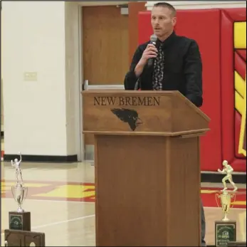  ?? Staff photo ?? New Bremen Cardinals football coach Chris Schmidt speaks Monday night during the football and volleyball team’s state recognitio­n.