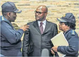  ?? Photo: Gallo Images ?? Unscathed: There have been no repercussi­ons so far for Riah Phiyega, Nathi Mthethwa and Zukiswa Mbombo.