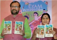  ?? PTI ?? Sushma Swaraj with Union HRD Minister Prakash Javadekar releases Modi’s book Exam Warriors at a function in New Delhi. —