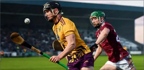  ??  ?? Wexford’s Mikie Dwyer taking on Jack Grealish of Galway when the sides met in the Walsh Cup final in Portlaoise in January.