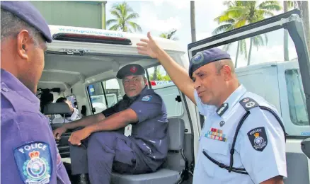  ?? Photo: Police Media Cell ?? Commission­er of Police Brigadier-General Sitiveni Qiliho speaks with some of the Police officers during the handover of 23 leased vehicles to the Police Special Response Unit in Nasinu on January 8, 2018.