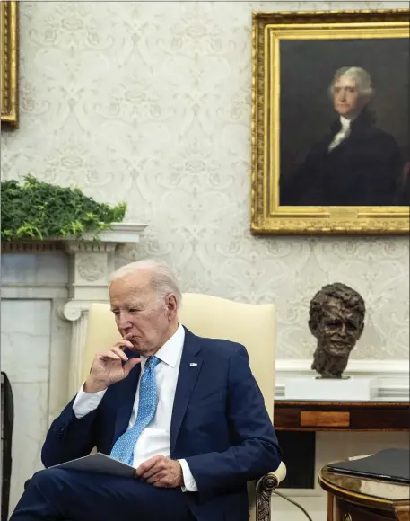  ?? EVAN VUCCI — THE ASSOCIATED PRESS ?? President Biden listens as Italian Prime Minister Giorgia Meloni speaks during a meeting in the Oval Office Friday.