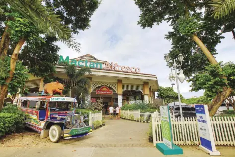  ?? ?? Satisfy your cravings for authentic Cebu lechon and other delectable cuisines at the Mactan Alfresco located right at the entrance of the township.
