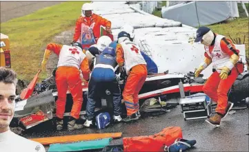  ?? GETTY PHOTOS ?? Jules Bianchi’s Marussia after it had slammed into a recovery tractor in rain and poor visibility at the Japanese Grand Prix in October. He would have turned 26 next month.