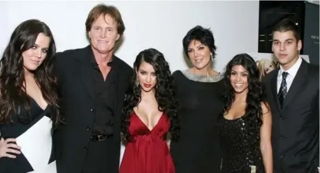  ?? ALBERTO E. RODRIGUEZ/GETTY IMAGES FILE PHOTO ?? As a man, Caitlyn Jenner was married to three women, including Kris Jenner, third from right. They are shown here in 2007 with Caitlyn’s stepchildr­en.