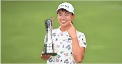  ?? GETTY IMAGES ?? Japan’s Hinako Shibuno celebrates after winning the AIG Women’s British Open on Sunday in Woburn, England.