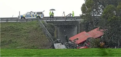  ??  ?? Police were at the scene of the crash on State Highway 27 yesterday. One person died and another was seriously injured in a fiery collision between a truck and a ute in Waharoa, Matamata.