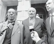 ?? ALGERINA PERNA/BALTIMORE SUN ?? Walter Lomax, shown at left in 2014, suffered a heart attack in the Miller Senate Office Building Wednesday. He was revived by Frederick County Sheriff Chuck Jenkins and Trooper First Class Luke Rafer.