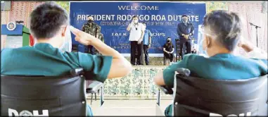  ??  ?? President Duterte salutes wounded soldiers during his visit to Kuta Heneral Teodulfo Bautista in Jolo, Sulu the other day. Also in photo are Sen. Bong Go and Defense Secretary Delfin Lorenzana, who underwent a swab test yesterday and is now on quarantine after an aide tested positive for COVID.