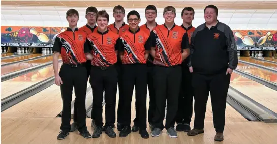  ?? Photo Provided ?? Pictured is the Minster boys bowling team which has qualified for the Division II state tournament on Saturday in Columbus. Front row (left to right) Matthew Wenning, Logan Klosterman, Brian Gonzalez, Cedric Ranly and Coach Austen Vanderhors­t. Back row (from left) are Rylan Edwards, Keetan Sharp, Wyatt Kemper, and Xavier Kitzmiller.