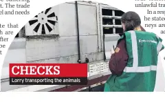  ??  ?? CHECKS
Lorry transporti­ng the animals