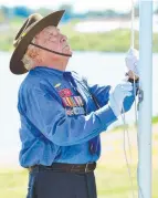  ?? Flagbearer Neville Coleman. ??