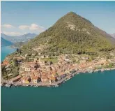  ?? ?? Campania e Lombardia. A sinistra, l’isola di Procida. Sopra, Monte Isola, nel lago d’Iseo, l’isola lacustre più grande d’Italia e fra le più estese d’Europa.