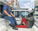  ?? Picture: SIMPHIWE NKWALI ?? DISARMED: A protester who was part of the march in Pretoria on Friday is chained in the back of a police van after being found in possession of a gun
