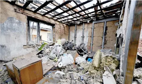  ?? AFP ?? This photograph shows a destroyed residentia­l house following a strike in the village of Tsirkuny, Kharkiv region. —