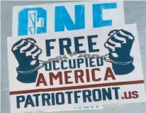  ?? COURTESY ?? Propaganda stickers were found on town and state property in Westport this week. Police said the small stickers were confirmed as recruitmen­t materials from a group called the Patriot Front.